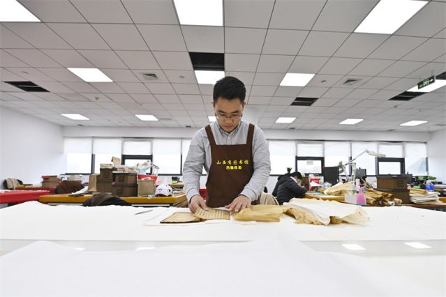 （文化）（1）我为古籍做“微创”(2971746)-20230423102143.jpg